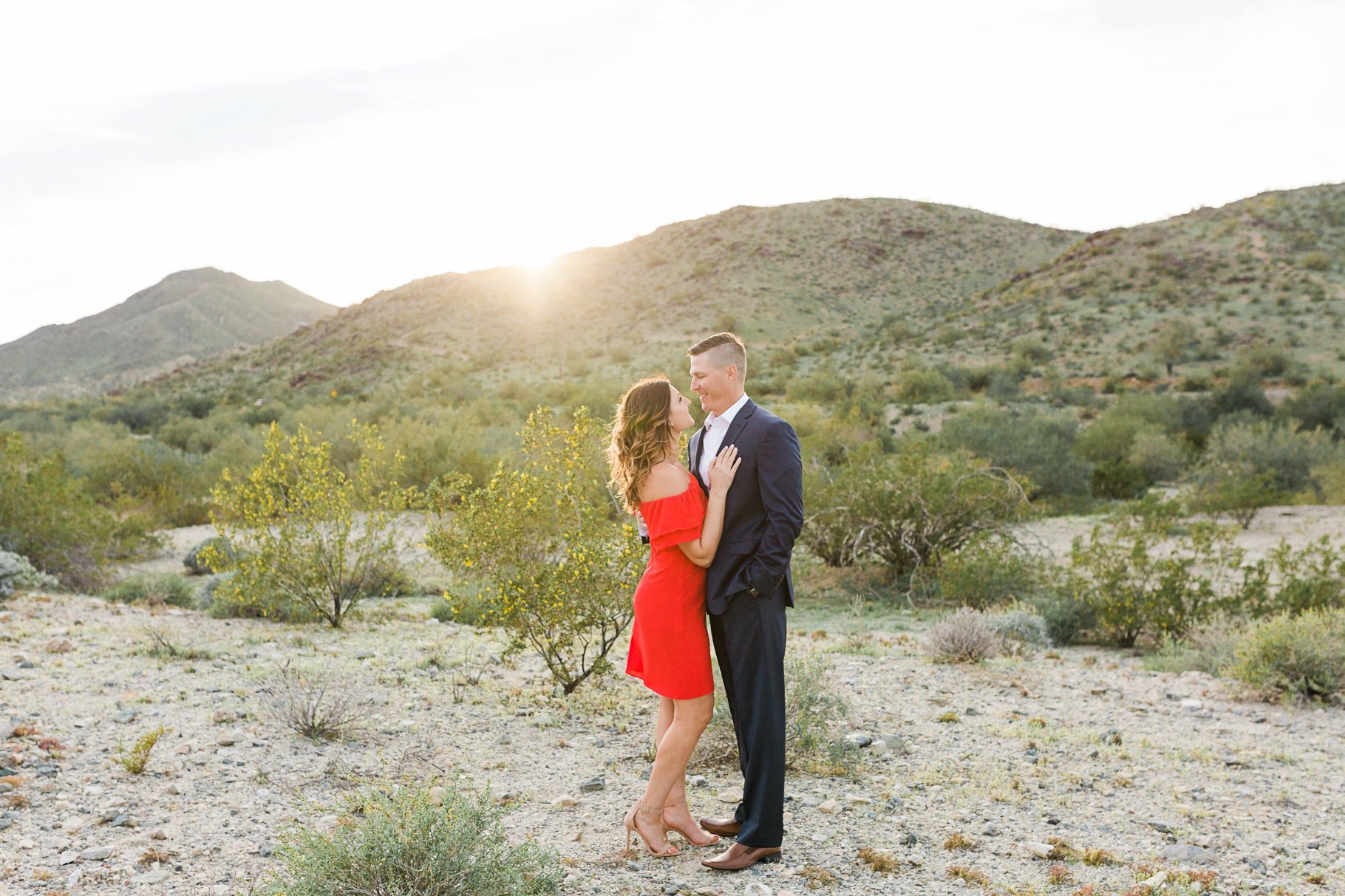 engagement session on South Mountain at sunset with girl in a red dress